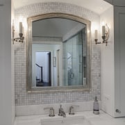 View of a Roman-styled bathroom which features a bathroom, bathroom accessory, ceiling, floor, home, interior design, room, sink, tile, window, gray