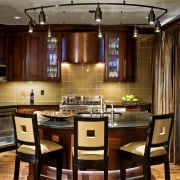 view of a kitchen which features a semi-circular countertop, dining room, interior design, kitchen, brown, red
