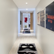 internal hallway view of an office building of ceiling, design, floor, flooring, interior design, room, wall, gray