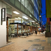 view of chews lane development,featuring pathed pathways,lighting,doors and building, city, metropolitan area, mixed use, shopping mall, brown