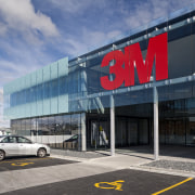 external view of 3M Head Office part of architecture, building, car, car dealership, commercial building, corporate headquarters, facade, metropolitan area, gray, black