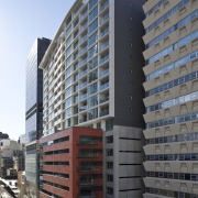 exterior view of  office building,featuring balconies, doors apartment, architecture, building, city, commercial building, condominium, corporate headquarters, facade, headquarters, metropolis, metropolitan area, mixed use, neighbourhood, real estate, residential area, sky, skyscraper, suburb, tower block, urban area, black, gray