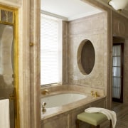 View of a bathroom which features a bathtub bathroom, ceiling, floor, home, interior design, room, wall, brown, white