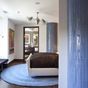 View of the master bedroom which features a architecture, ceiling, floor, flooring, hardwood, home, interior design, laminate flooring, living room, room, wall, wood, wood flooring, gray