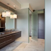 View of a bathroom which features long vanity architecture, bathroom, cabinetry, ceiling, floor, flooring, hardwood, home, interior design, laminate flooring, real estate, room, tile, wood flooring, gray