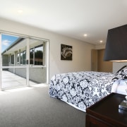 View of master bedroom of this Platinum Homes architecture, bedroom, ceiling, estate, home, house, interior design, property, real estate, room, suite, window, gray, white