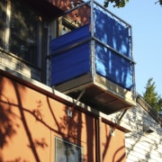 Exterior view of this home which features an architecture, building, daylighting, facade, home, house, residential area, roof, siding, sky, tree, window