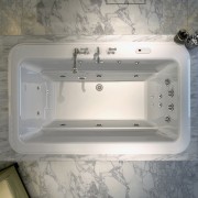 View of a bathroom which features a bathtub bathroom sink, bathtub, hardware, plumbing fixture, product design, sink, gray