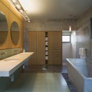 View of bathroom which features a cantilevered limestone architecture, bathroom, estate, floor, home, interior design, real estate, room, brown