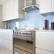 View of a kitchen which features Smeg appliances cabinetry, countertop, cuisine classique, home appliance, interior design, kitchen, kitchen stove, white