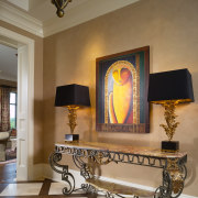 View of the updated foyer of the condominium. ceiling, furniture, home, interior design, living room, room, table, wall, brown