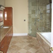 View of the condominium bathroom before renovation. bathroom, floor, flooring, hardwood, home, interior design, laminate flooring, property, real estate, room, tile, wall, wood, wood flooring, brown, orange