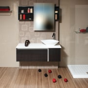 View of a bathroom with a vanity from bathroom, bathroom accessory, bathroom cabinet, floor, flooring, interior design, plumbing fixture, product, product design, room, sink, tile, wood flooring, gray