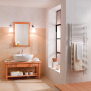View of a bathroom which features a towel bathroom, bathroom accessory, bathroom cabinet, floor, interior design, plumbing fixture, product design, room, sink, gray