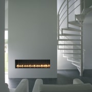 View of a living area which features a daylighting, fireplace, hearth, interior design, light fixture, lighting, product design, gray