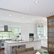 A view of a kitchen by Julie Hacker ceiling, countertop, daylighting, home, interior design, kitchen, living room, room, white, gray