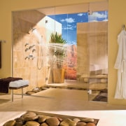 View of a bathroom which features bathroomware from door, furniture, interior design, window, orange