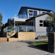 Exterior view of a home built by Keola architecture, building, cottage, elevation, facade, home, house, property, real estate, residential area, siding, gray