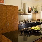 The owners of this kitchen, designed by the countertop, interior design, kitchen, room, table, brown, orange