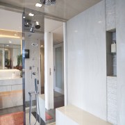 View of a bathroom which features glass shower bathroom, ceiling, floor, glass, interior design, room, wall, gray, white