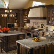 View of a contemporary kitchen which features countertops cabinetry, countertop, cuisine classique, interior design, kitchen, room, brown