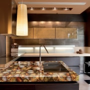 View of a contemporary kitchen which features countertops countertop, flooring, interior design, kitchen, brown