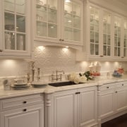 A view of a kitchen by Downsview Features cabinetry, countertop, cuisine classique, home, interior design, kitchen, room, under cabinet lighting, window, orange, brown