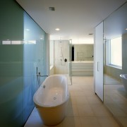 Bathroom with sleek design value - Bathroom with architecture, bathroom, ceiling, daylighting, floor, glass, home, house, interior design, property, real estate, room, gray