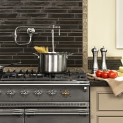 View of hand-built Lacanche French ranges offered by countertop, cuisine, gas stove, home appliance, kitchen, kitchen appliance, kitchen stove, small appliance, black, white