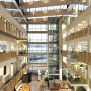 View of the atrium of the new BNZ apartment, building, ceiling, condominium, daylighting, institution, interior design, lobby, mixed use, shopping mall, brown, white