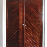 The Loui Corporation works in partnership with paint cabinetry, cupboard, door, hardwood, wardrobe, wood, wood stain, red, white