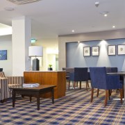 View of the Takapuna Metlifecare. - View of ceiling, conference hall, floor, flooring, furniture, interior design, lobby, real estate, restaurant, room, table, waiting room, gray