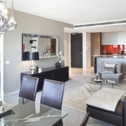 The woven wicker and teak furniture on this interior design, living room, room, suite, gray