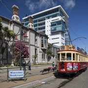 View of the Club Tower offices in Christchurch, architecture, building, cable car, city, downtown, house, landmark, metropolis, metropolitan area, mixed use, neighbourhood, real estate, residential area, sky, town, tram, transport, tree, urban area, vehicle, gray, blue