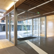 View of mixed use development at 8 Nugent. architecture, ceiling, daylighting, floor, glass, house, interior design, lobby, real estate, window, brown, white