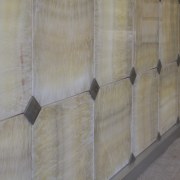 NFK custom-designs architectural connecting features that bring out floor, material, wall, wood, wood stain, gray