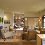 he light-filled linking elements are defined by translucent ceiling, interior design, living room, real estate, room, brown