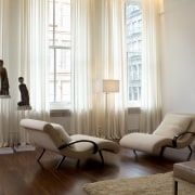 View of living room featuring floor length sheer chair, couch, curtain, floor, flooring, furniture, hardwood, home, interior design, living room, room, table, window, window covering, window treatment, wood, white
