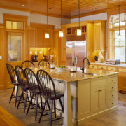 View of kitchen featuring antique heart pine tongue cabinetry, ceiling, countertop, cuisine classique, dining room, floor, flooring, hardwood, home, interior design, kitchen, real estate, room, table, wood, wood flooring, brown, orange