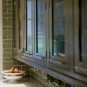 This kitchen was the overall winner of the glass, home, interior design, window, window covering, brown, gray