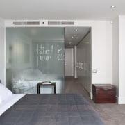 The bedroom and bathroom in the master suite architecture, floor, interior design, room, wall, gray, white