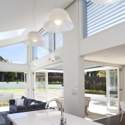 A kitchen interior designed by Anna Welsh MDINZ, ceiling, daylighting, house, interior design, kitchen, light fixture, lighting, window, gray, white