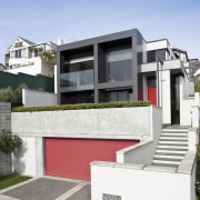 View of the exterior featuring aluminum cladding. - architecture, building, elevation, facade, home, house, neighbourhood, property, real estate, residential area, suburb, teal, white