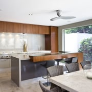 View of teak cabinetry, stone benchtops, lighting city countertop, interior design, kitchen, real estate, white