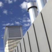 Zinc cladding featuring an angled seam, manufactured and architecture, building, cloud, daylighting, daytime, energy, facade, roof, sky, gray, blue