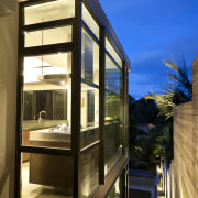 View of kitchen featuring american walnut base cabinets, architecture, home, house, property, real estate, window, brown, blue