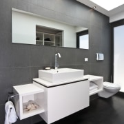 View of the bathroom with black wall tiles bathroom, floor, flooring, interior design, product design, sink, tap, white, black, gray