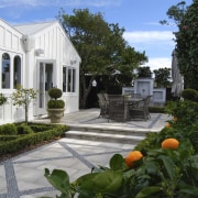 View of formal garden designed by Michael Mansvelt backyard, cottage, courtyard, estate, garden, home, house, landscaping, neighbourhood, outdoor structure, plant, real estate, walkway, yard