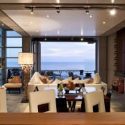 View of the living space featuring Capri, Design apartment, interior design, living room, real estate, restaurant, brown