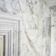 Interior view of this unique bathroom features a wall, white